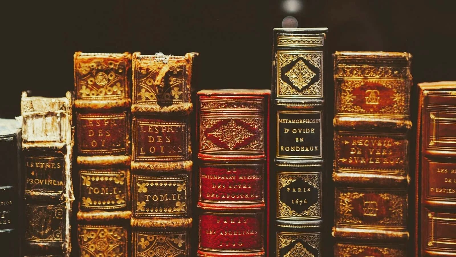 A shelf of rare antique hardback books